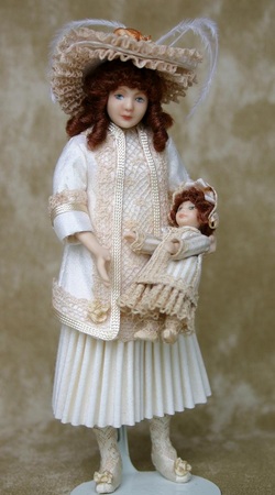 Miniature child doll